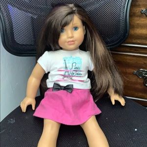 I’m selling an American girl doll!